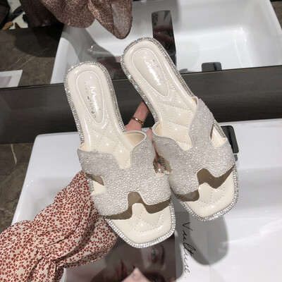Korean version of Baitao diamond H slippers for women wearing simple flat-soled recreational slippers outside the ins harbour in s
Korean version of Baitao diamond H slippers for women wearing simple flat-soled recreational slippers outside the ins harbour in s