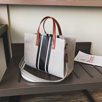 Bag female 2019 new wave Korean fashion casual canvas wild portable wide shoulder strap shoulder slung tote bag
Bag female 2019 new wave Korean fashion casual canvas wild portable wide shoulder strap shoulder slung tote bag