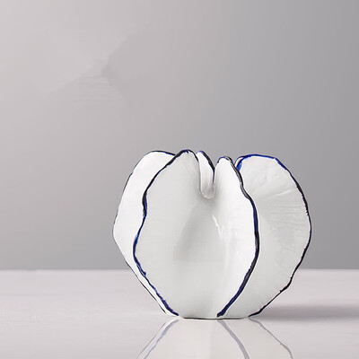 Ceramic art carambola shape vase home decor porcelain crafts ornaments room decoration dried flower vase
Ceramic art carambola shape vase home decor porcelain crafts ornaments room decoration dried flower vase