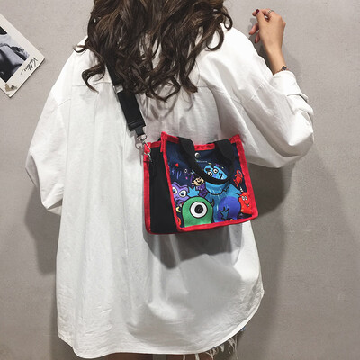 Canvas bag female slung 2019 new Korean version of the wild cartoon print handbag casual simple wide shoulder strap bag tide
Canvas bag female slung 2019 new Korean version of the wild cartoon print handbag casual simple wide shoulder strap bag tide