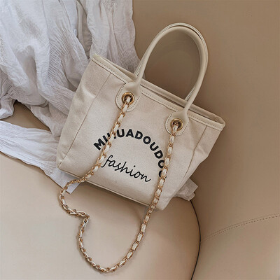 Qiao Bani 2019 new European&American style fashion simple canvas chain bag hand strap shoulder tide female bag a generation
Qiao Bani 2019 new European&American style fashion simple canvas chain bag hand strap shoulder tide female bag a generation