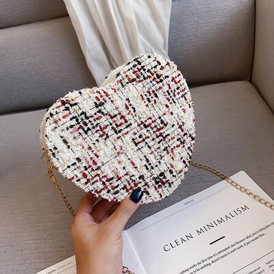Sen temperament chain Messenger bag fashion wild personality heart-shaped bag female 2019 new simple contrast color woven bag
Sen temperament chain Messenger bag fashion wild personality heart-shaped bag female 2019 new simple contrast color woven bag
