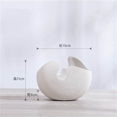 White eggshell shape design ceramic flower vase Nordic porcelain home decor vase home decoration table creative flower arrangement
White eggshell shape design ceramic flower vase Nordic porcelain home decor vase home decoration table creative flower arrangement