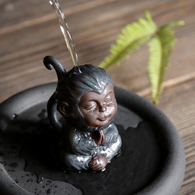 Creative retro purple tea pet little monkey Zen boutique figurines tea pet Qitian small monkey car ornaments
Creative retro purple tea pet little monkey Zen boutique figurines tea pet Qitian small monkey car ornaments