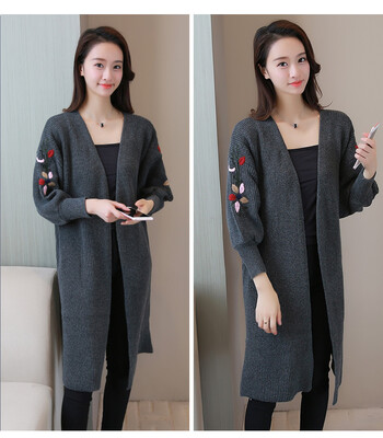 Spring and autumn winter embroidery pocket wild sweater sweater ladies cardigan loose jacket in the long section
Spring and autumn winter embroidery pocket wild sweater sweater ladies cardigan loose jacket in the long section