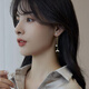 Moon with people pearl earrings long temperament earrings female 2021 Korean net red earrings new trendy fishtail pearl earrings pearl fishtail earrings Moon with people pearl earrings long temperament earrings female 2021 Korean net red earrings new trendy fishtail pearl earrings pearl fishtail earrings
