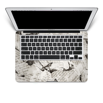SkinAT 苹果笔记本MacBook手托保护贴膜 不含键盘 3M材料 凌乱的报纸 Pro 15