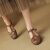 BUDDY BELLE女鞋2024夏季丁字扣复古罗马鞋粗跟镂空猪笼鞋包头凉鞋女 棕色  35
