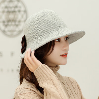 

Autumn&winter new 100 sets of warm knitted wool cap Wool ladies Korean version after opening bow bow pure color pot cap