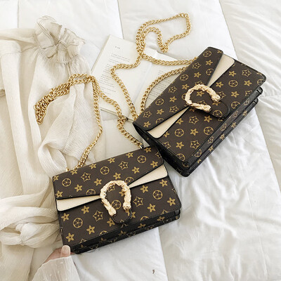 

Qiao Bani 2019 new European&American style fashion old flower hit color wine god bag slant diagonal tide female bag direct sales