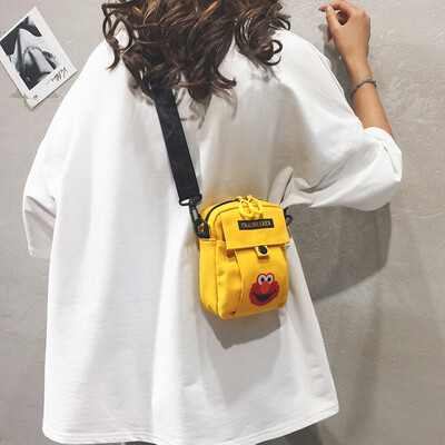 

Net red small bag female bag new 2019 Korean version of Harajuku student canvas bag Sesame Street Messenger bag girl ins