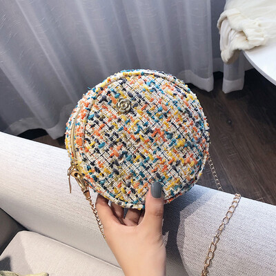 

Fashion wild personality small round bag 2019 new simple contrast color woven bag female Sen temperament chain Messenger bag