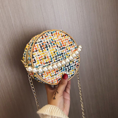 

2019 new fashion pearl handbag female literary sen woven bag casual wild chain shoulder Messenger bag