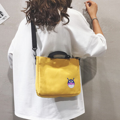 

Small bag female 2019 new fashion cartoon printing shoulder bag Korean version of Harajuku student canvas Messenger bag
