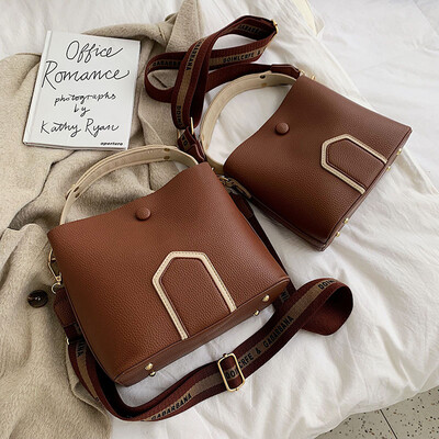 

Contrast color small slung bucket bag 2019 new Korean version of Joker simple litchi pattern shoulder bag