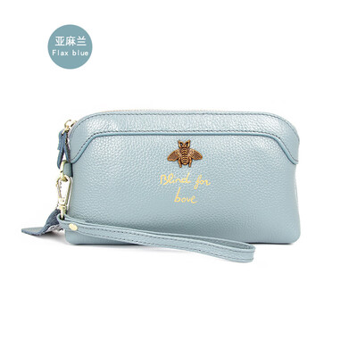 

The first layer of cowhide 2019 new ladies leather Europe&America bee bills position shell type clutch bag long wallet