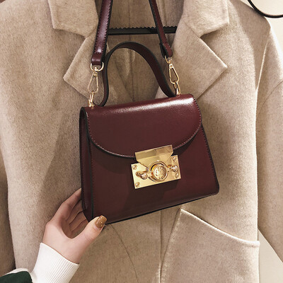 

Qiao Bani 2019 new South Korea ins fashion solid color simple lock flip cover bag shoulder shoulder diagonal female bag