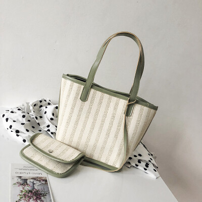 

2019 new wave Korean version of the high-end sense of the ocean handbag female wild striped knit mother bucket shoulder bag