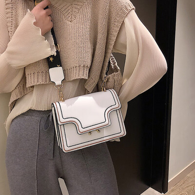 

Qiao Bani 2019 new Korean chic fashion embroidery line hit color ribbon wild small square bag shoulder diagonal female bag