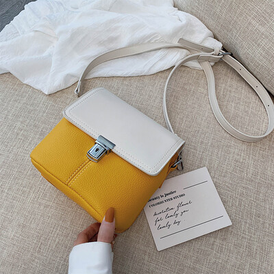 

Bucket bag female new Korean version of the simple wild hit color lock buckle shoulder Messenger bag tide