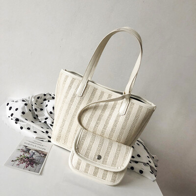 

2019 new wave Korean version of the high-end sense of the ocean handbag female wild striped knit mother bucket shoulder bag