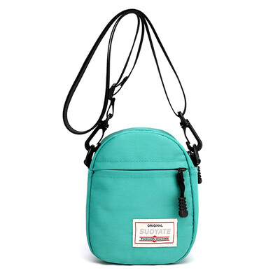 

Candy-colored mini-shoulder bag Korean version fashion pocket pocket bag with all sets of vertical mobile bag inclined canvas