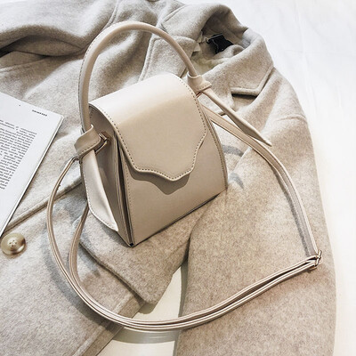 

Qiao Bani 2019 new Korean ins fashion simple solid color geometric bag portable wild shoulder diagonal female bag