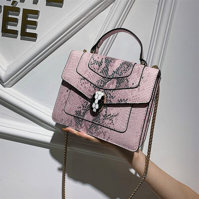 

Qiao Bani 2019 new European&American style fashion snake head BV snake pattern flip bag hand strap shoulder diagonal trend handbags