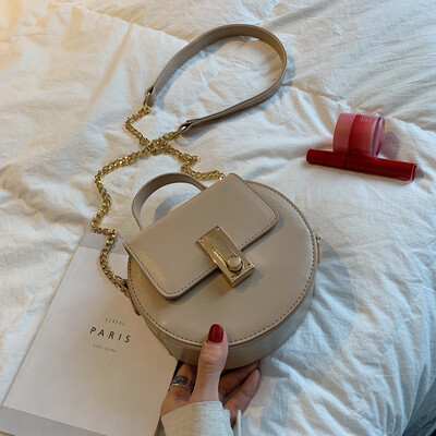 

Summer girls small round bag 2019 new Korean version of the network celebrity hand-held small bag lock chain bag slanted womens
