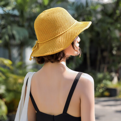 

Korean version of summer Joker fisherman hat tie bow straw hat womens summer small fresh knit beach holiday visor