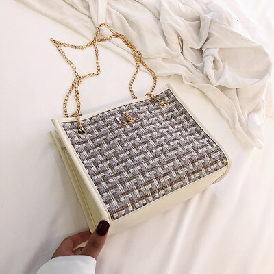 

2019 new simple contrast color woven bag fashion casual wild shoulder bag female Sen temperament chain Messenger bag