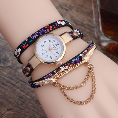 

New broken pattern ladies winding fine strap watch female models fashion wings pendant quartz watch