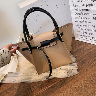 

Qiao Bani 2019 new European&American style fashion simple street shooting stitching wings bag shoulder shoulder diagonal tide handbag