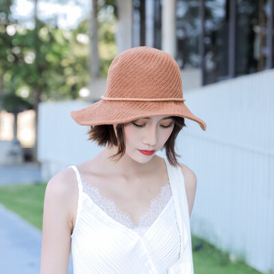 

The Korean version of Xia Bais fishing cap is worn with a bow-tie straw hat