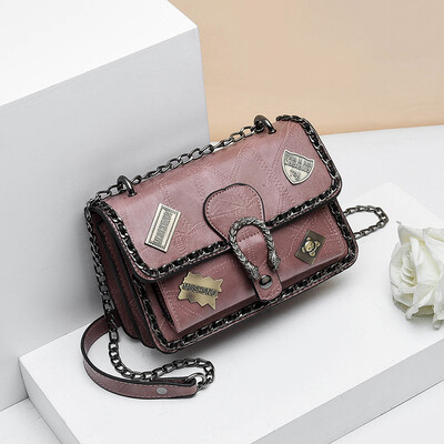 

Retro spring&summer tide woman hand-held retro badge 100 lap rivets chain single shoulder oblique satchel bag