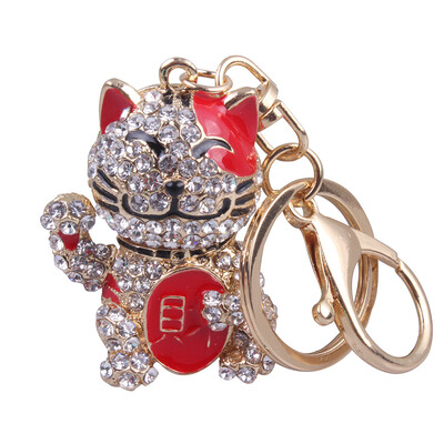 

Korean version of the creative alloy diamond lucky cat cartoon cute smile cat car bag pendant