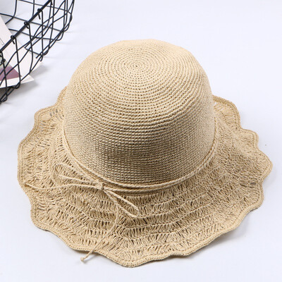 

New ladies outdoor outing bow sun hat vacation hollow sun hat hundred set summer straw hat wholesale