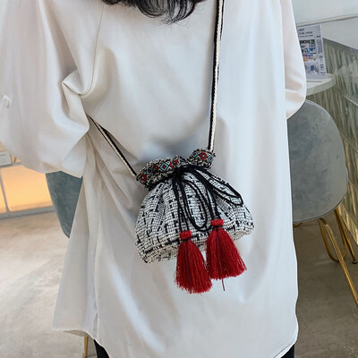 

Fringe bucket bag female 2019 new Korean version of the tide wild mini diagonal cross bag linen striped ethnic wind shoulder bag