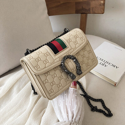 

Qiao Bani 2019 new European&American style fashion ribbon PU indentation hit color wine god bag slant diagonal cross trend handbags