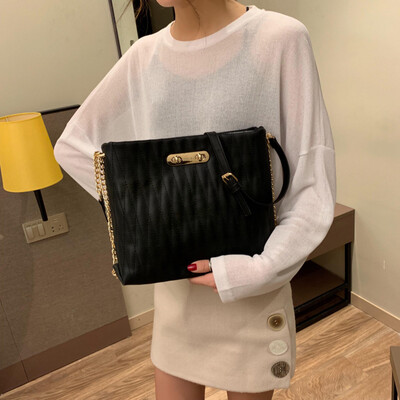 

Qiao Bani 2019 new European&American style fashion simple solid color embroidery line lock single shoulder diagonal trend handbags wholesale