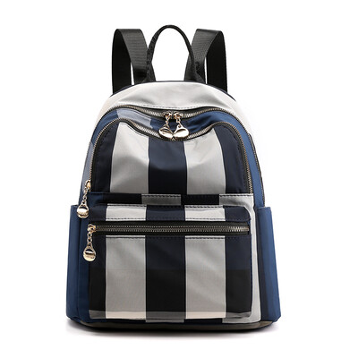 

Double shoulder bag female Korean version tide Oxford small backpack lady travel all kinds of fashion canvas schoolbag