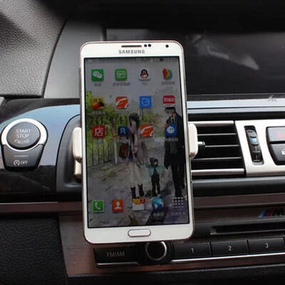 

Universal Car Phone Holder Mini Car Outlet Holder For Iphone X XR 8 7 Huawei Xiaomi