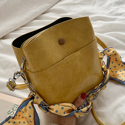 

Summer 2019 new bucket scarf solid color Korean leisure Joker shoulder slung a small bag of women