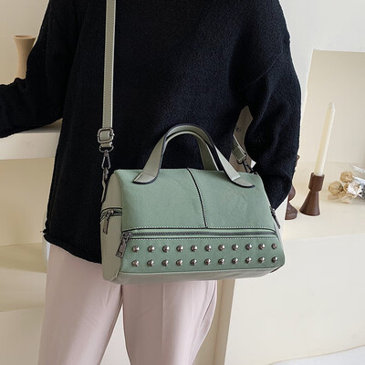 

Ins super fire bag female bag new 2019 Korean version of the fashion rivet texture wild shoulder slung Boston bag