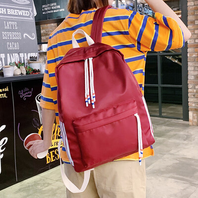 

2019 new canvas backpack student bag large capacity solid color multi-pocket backpack computer Korean version of the tide men&women