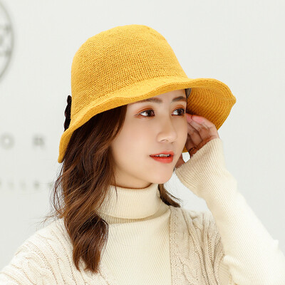 

Autumn&winter new 100 sets of warm knitted wool cap Wool ladies Korean version after opening bow bow pure color pot cap