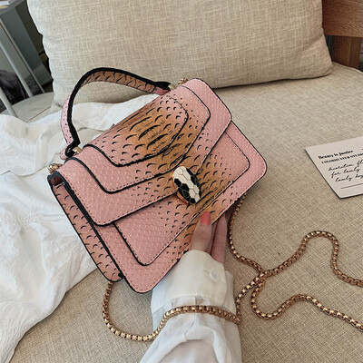 

Qiao Bani 2019 new European&American style fashion snake pattern transition color BV snake head flip cover shoulder shoulder diagonal handbag