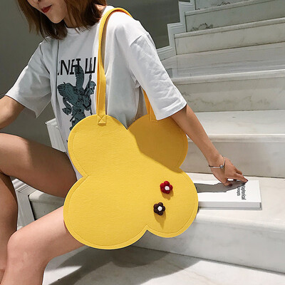 

New Japanese girl flower tote bag cute shoulder bag simple felt flower wild handbag