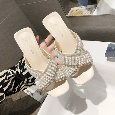 

Fairy wind sandals slippers women wear Korean version of 100 cross water drill thick heel slippers