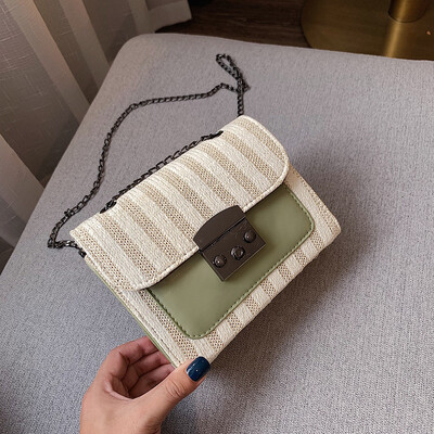 

2019 new fashion wild striped shoulder bag female Sen temperament chain Messenger bag simple contrast color woven bag